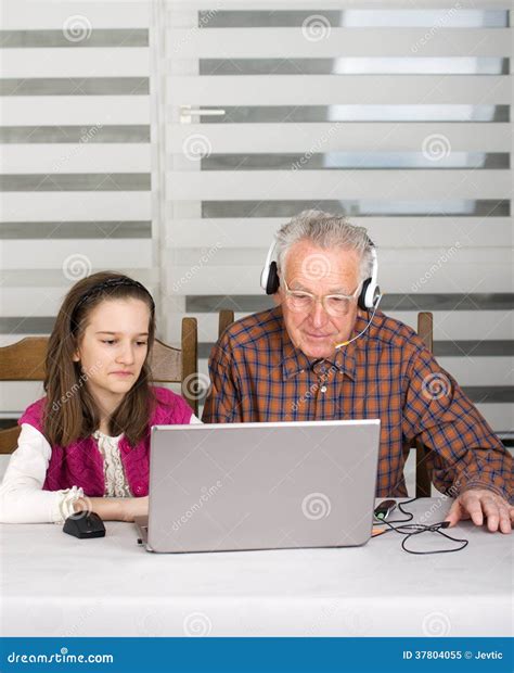 Girl And Old Man On Laptop Stock Image Image Of Elderly 37804055