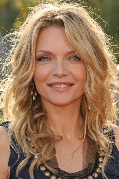 This angled bob shapes the face and flaunts the popular beach wave. BEST CELEBRITY HAIRSTYLES for WOMEN over 50 - WEHOTFLASH