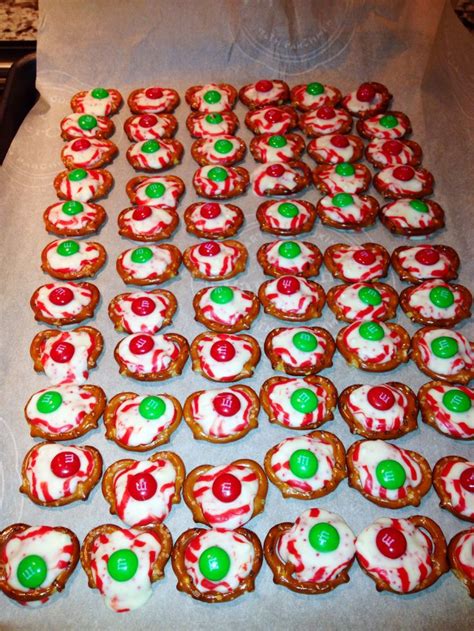 They are made with cocoa powder and melted chocolate, with kisses pressed into the top, which is basically chocolate heaven. Pretzel, Hershey kisses, M&M treats! #christmas #treats # ...