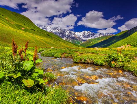 Scenery Mountains Stream Grass Clouds Nature