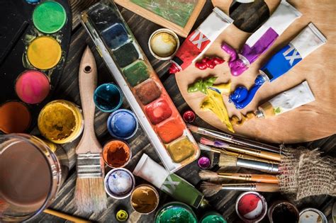Premium Photo Artist Paint Brushes And Paint Cans Of Paint Over