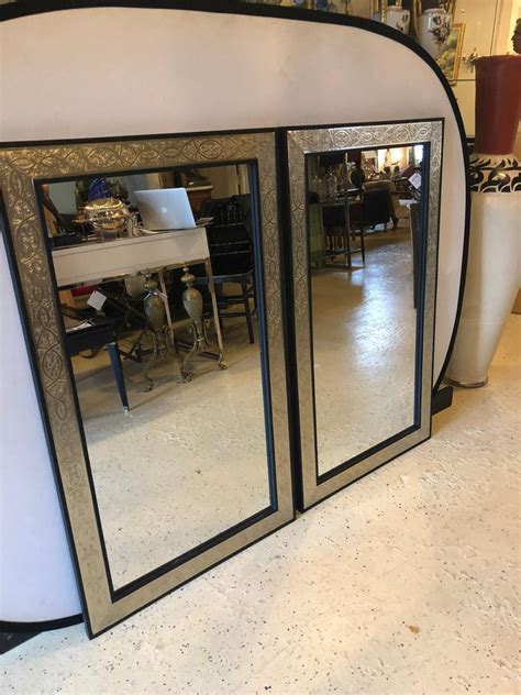 Pair Of Hollywood Regency Brass Over Wood Moroccan Black Mirrors For
