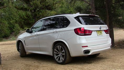 Driving the used 2014 bmw x5. 2014 BMW X5 xDrive50i - Defies the Laws of Physics Review - The Fast Lane Car