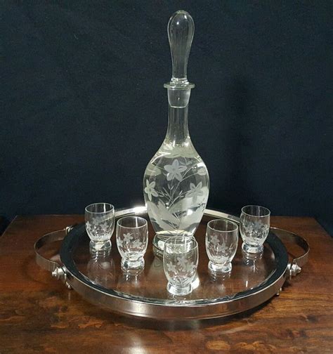 In the 1900s, carnivals and fairgrounds gave away carnival glass as prizes that they also called aurora, rainbow and taffeta glass. Vintage Etched Decanter Shot Glasses Made In Romania With ...