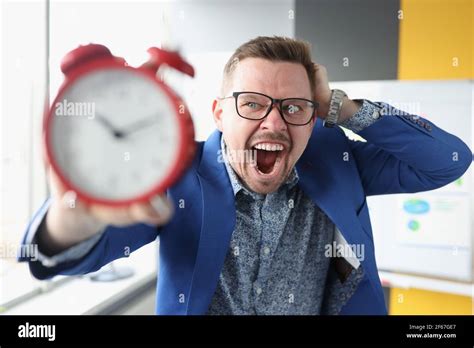 Angry Man Alarm Clock In Hi Res Stock Photography And Images Alamy