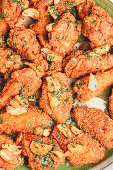 The meat is moist and flavourful, and the coating hits all the right crispy and salty notes. kruizing with kikukat: Fried Garlic Chicken
