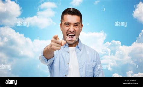 Angry Man Shouting And Pointing Finger On You Stock Photo Alamy