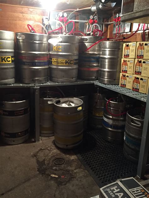 Several Kegs Are Stacked Up In A Storage Area