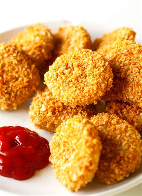 I dare even say that chicken nuggets are possibly our favorite food. Chick'n Nuggets {Copycat Recipe}