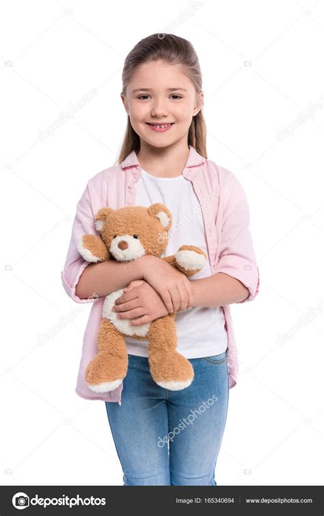 Smiling Girl Holding Teddy Bear — Stock Photo © Igorvetushko 165340694