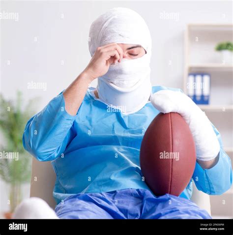 The Injured American Football Player Recovering In Hospital Stock Photo