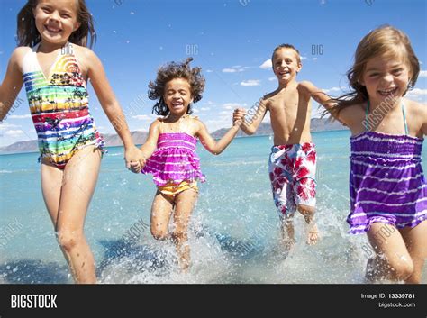 Kids Playing Beach Image And Photo Bigstock