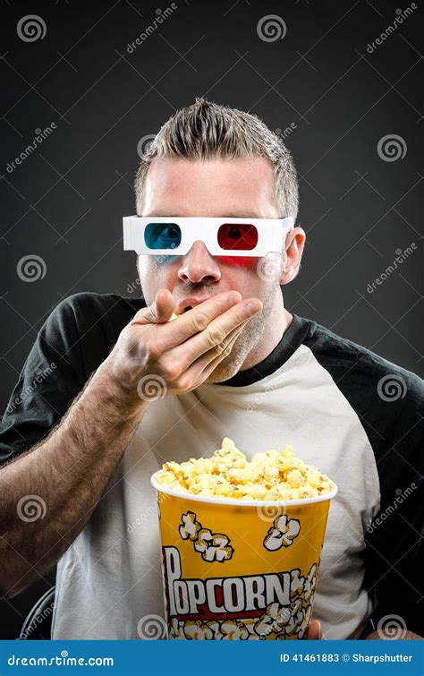 Man Eating Popcorn Wearing 3d Glasses Royalty Free Stock Photography