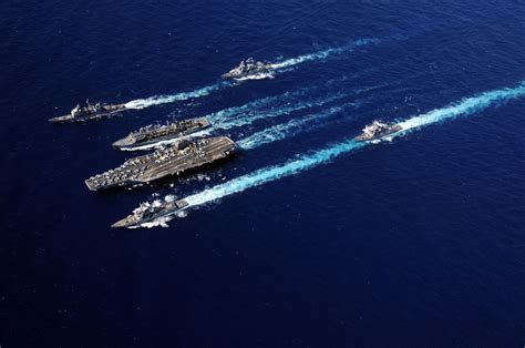 aircraft carrier uss abraham lincoln cvn 72 conducting an underway replenishment the middle