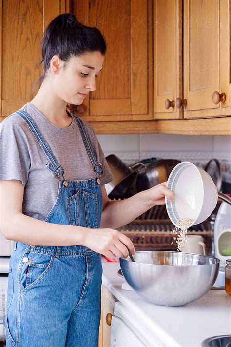 Woman Cooking In The Kitchen By Stocksy Contributor Luis Velasco