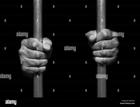 Hands Holding Bars Black And White Stock Photos And Images Alamy