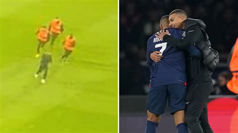 major security breach as pitch invader is able to grab kylian mbappe before leading psg stewards