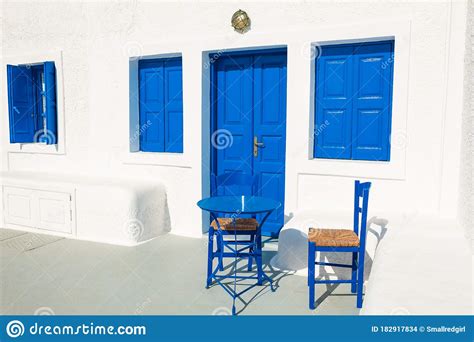 Traditional Greek White Architecture With Blue Doors And