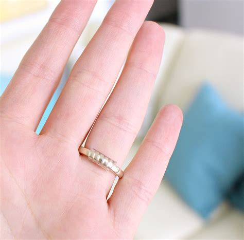 They then told me, after it was already made and bought, that they can't size my ring down to smaller than a 3.5 because it wouldn't be able to hold the diamond. How to Temporarily Make a Ring Smaller | Dans le Lakehouse