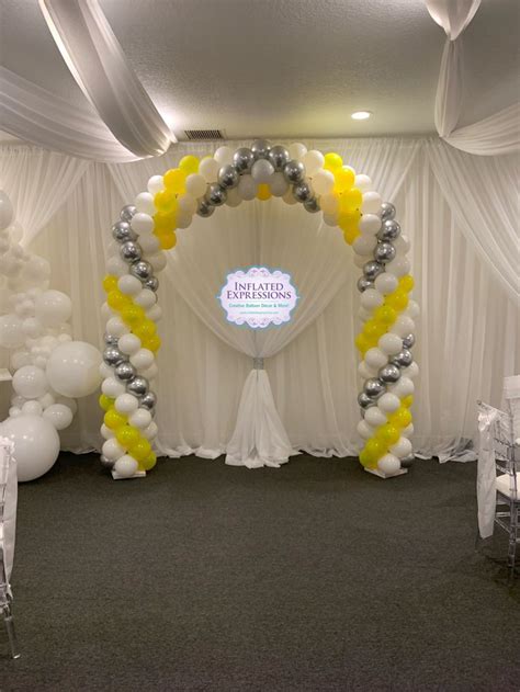 Balloon Arch Decoration For A 70th Birthday Party And Wedding Vow