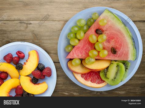 Sliced Fruit On Brown Image And Photo Free Trial Bigstock