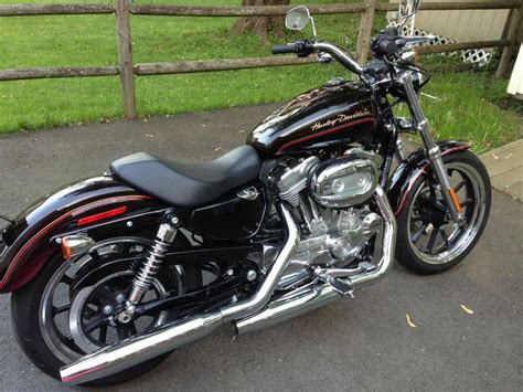 Cover, handle bar grips, leather bagthe bike was kept in the garage.there is absolutely nothing wrong with the bike and it rides like new. Buy 2011 Harley-Davidson Sportster 883 SUPERLOW Cruiser on ...