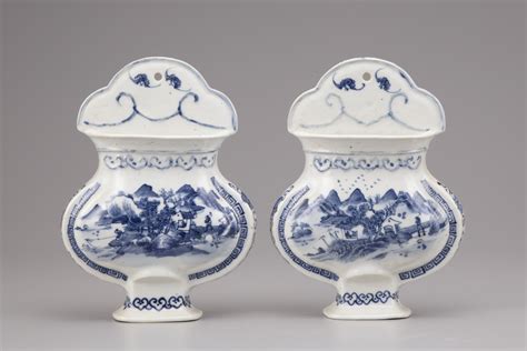 A Pair Of Blue And White Porcelain Wall Vases Oaa