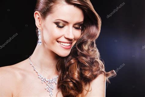 Portrait Of A Beautiful Happy Brunette Girl With Luxury Accessories