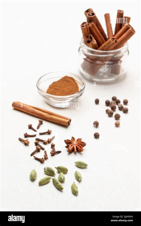 Cardamom Cloves And Star Anise On The Table Cinnamon Sticks In A