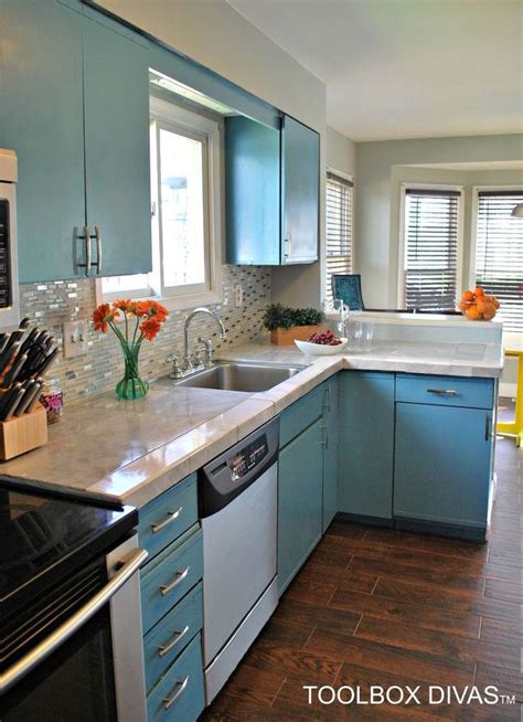No more renting a giant sander and spending hours trying to strip off the old finish or just a different view of the kitchen the sink is the same and subway tiles were there before take a good look. 13 Kitchen Paint Colors People Are Pinning Like Crazy ...