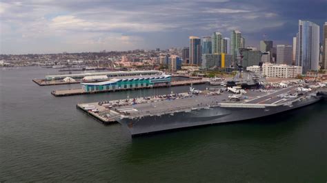 Uss midway flight simulators you can experience two flight simulators, the air combat 360 and flight avionics. Aerial view of the San Diego skyline and the USS Midway ...