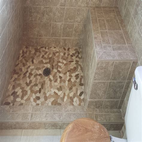 Sliced Tan And White Pebble Tile Shower Pan Tilehub