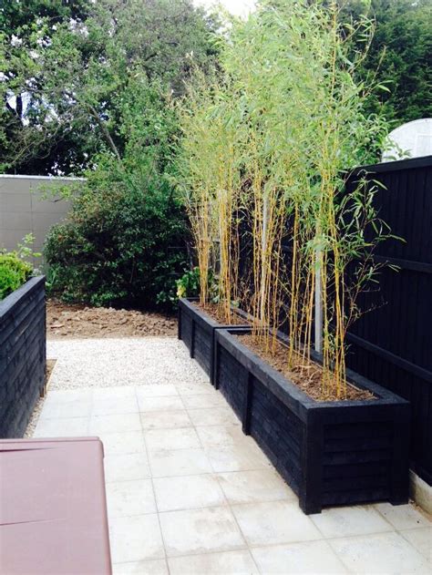 In the modern world privacy seems to be unobtainable: Hand crafted planters provide are ideal for containing bamboo screen | Small garden design ...