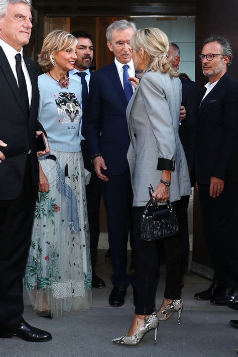 First Lady Brigitte Macron Attends Dior Retrospective Opening