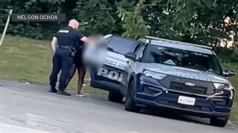 prince george s county police investigating officer embracing woman in police cruiser shocking