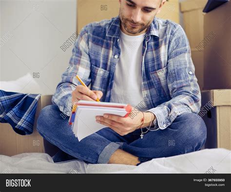Moving Man Sitting On Image And Photo Free Trial Bigstock