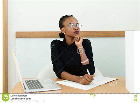 Confident Black Business Woman In Glasses Holding Chin
