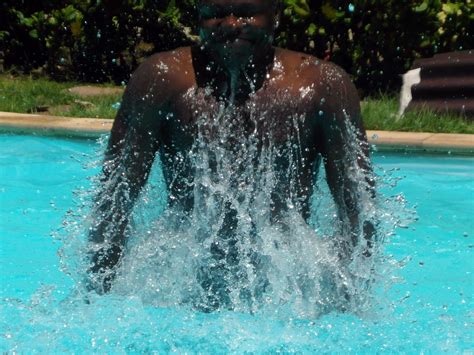 Man Splashing In The Pool Free Stock Photo Public Domain Pictures