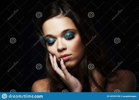 Bright Eyeshadows Create A Dramatic Look Shot Of A Beautiful Young