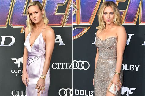 Brie Larson And Scarlett Johansson Wear Avengers Themed Jewelry To The Films Premiere Burning