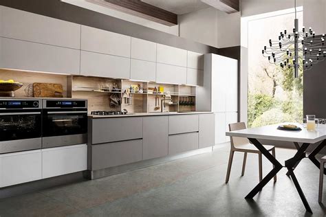 In laccato, impiallacciato, laminato… ecco 11 modelli di cucina grigia, elegante e sofisticata, perfetta per convivere con l'ambiente soggiorno. Cucina Moderna Grigia - The Homey Design