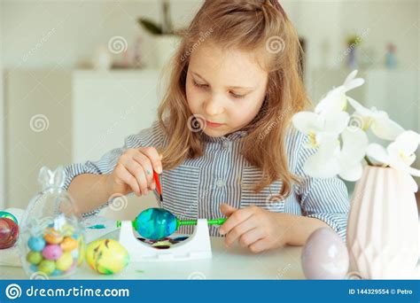 Cute Little Blonde Girl Painting Easter Eggs Stock Photo Image Of