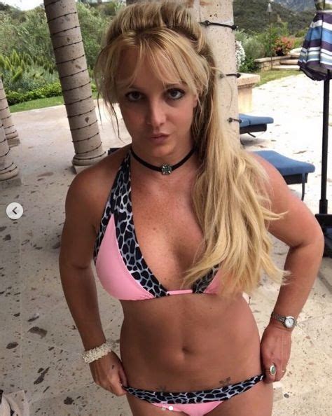 Britney Spears Stuns Running Barefoot In Grass With Skimpy Bicycle Ride