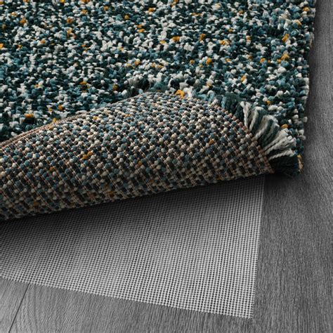 The dense, thick pile dampens sound and provides a soft surface to walk on. VINDUM Rug, high pile - blue-green - IKEA