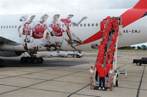 emirates unveils arsenal branded plane ahead of team s pre season trip to singapore