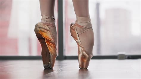 Ballet Dancers On Pointe Feet