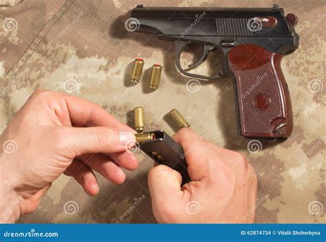 Men Load Ammo In The Clip Makarov Pistol Stock Photo Image Of