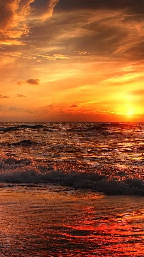 Glorious red and orange sunset at the North Sea wallpaper - backiee