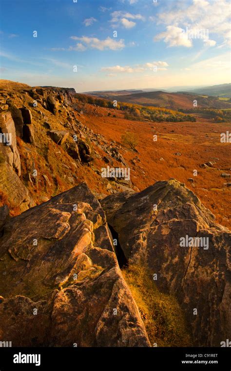 Stanage Edge Escarpment And Views Of Countryside In Autumn Near