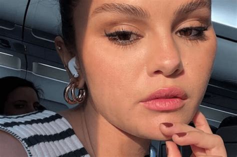 An Intimate Selfie Under The Covers Teases A Sultry Topless Snap By Selena Gomez